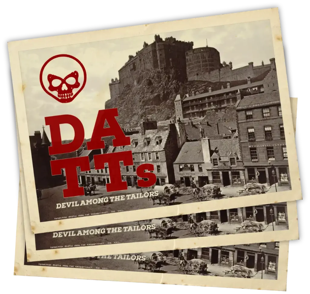 A stack of vintage postcards showing The Grassmarket in Edinburgh with the DATTs logo printed on